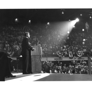 Democratic Presidential candidate John F. Kennedy addressing an estimated crowd of 8,000 at Reynolds Coliseum