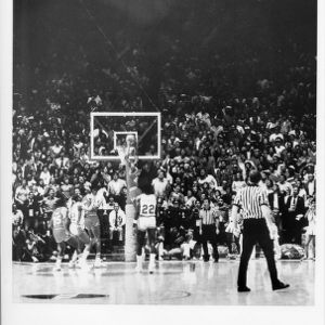 North Carolina State University's Lorenzo Charles dunks winning basket in 1983 NCAA championship game against Houston, April 3, 1983.