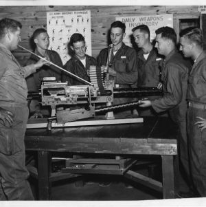 NC State College alumni instructed on machine gun in class at Quartermaster School in Fort Lee, Virginia