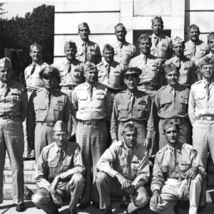 Colonel Samuel A. Gibson and other NC State College military personnel on steps of Memorial Bell Tower