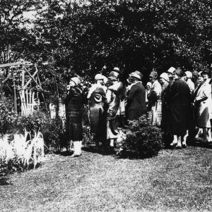 Group of women standing in a garden