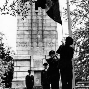 Cadets raising flag at Bell Tower Memorial