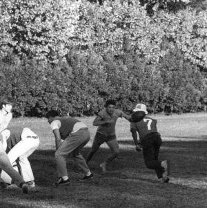 Military cadets playing football