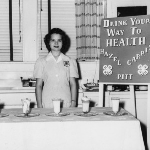 Hazel Carris of Pitt County at her 4-H exhibit, "Drink Your Way to Health"