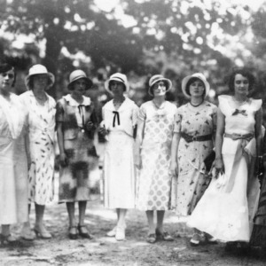 Group of eight women standing outside