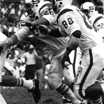 North Carolina State University defensive linemen Clyde Chesney (88) and George Smith (66)