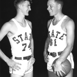 North Carolina State College basketball forwards Joe Stoll (74) and Bob Cook (81).