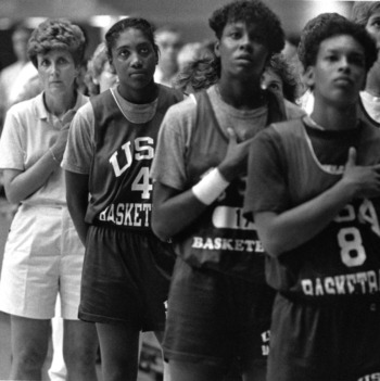 Coach Kay Yow and the United States Olympic team show pride during the playing of the National Anthem before an exhibition game in Raleigh