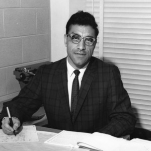 Professor Michael Amein at desk