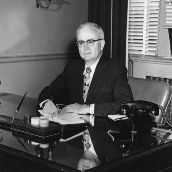 Carey H. Bostian sitting at his desk