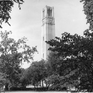 Memorial Tower with trees in foreground, North Carolina State College