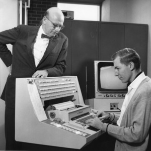 Dr. Henry L. Lucas and Donald C. Martin using "Tomorrow's Computer"