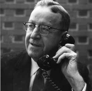 L. L. Ivey on telephone