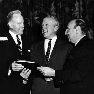 Chancellor John T. Caldwell, Postmaster General J. Edward Day, and Anthony J. Celebrezze at ceremony for higher education stamp