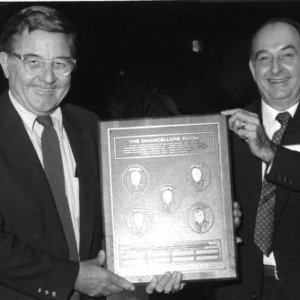 William C. Friday and William L. Turner with Chancellors Room plaque