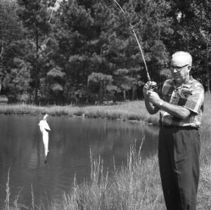Fred M. Haig fishing on his Raleigh farm