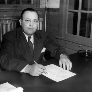 Thomas M. Hamby at desk