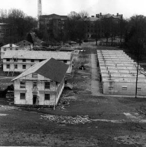 View of the Court of North Carolina showing quonset huts and temporary classrooms under construction.
