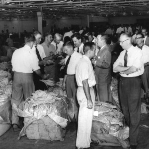 Tobacco auction, Salisbury, North Carolina, June 30, 1964.