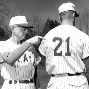 Baseball coach Vic Sorrell with one of his players