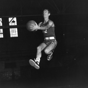 N.C. State basketball's #72, Jack McComas Jr. "in flight"