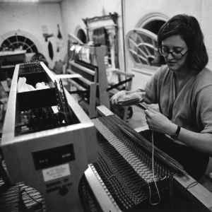 Beth Humphrey, senior in Textile Design, at weaving machine