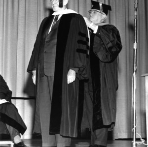 Dean J. Harold Lampe with Dr. George P. Geoghegan at Geoghegan's receiving of Honorary Degree of Doctor of Humanities
