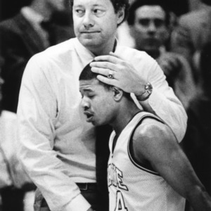Coach comforting Wake Forest player