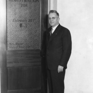 William L. Mayer outside Registration office