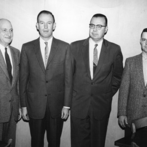 L. R. Harrill, left, with 4-H adult leaders, Wake County, 1960