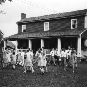 Recreation program conducted by Lucy Blake at a 4-H club meeting in Pender County, North Carolina, in 1917