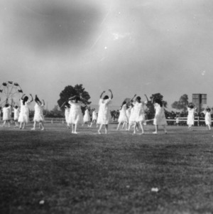 Women dancing in a pageant at the Sandhill Fair in 1922