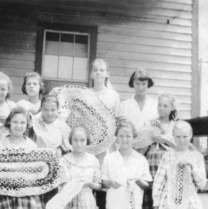 4-H club members of Tabor, North Carolina (in Columbus County) demonstrating their braided rugs