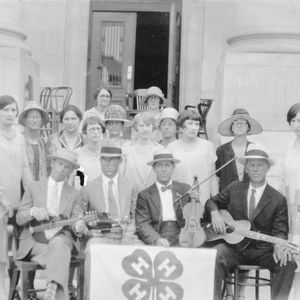 Johnston County 4-H Club members holding instruments