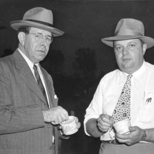 NC Governor Joseph Melville Broughton and Mr. Coble eating ice cream at Central Piedmont Junior Dairy Show