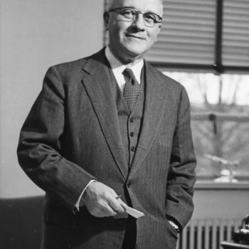 Dean J. Harold Lampe at desk