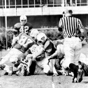 Tackle during N. C. State versus University of South Carolina football game