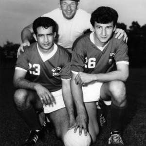 N. C. State soccer players and coach