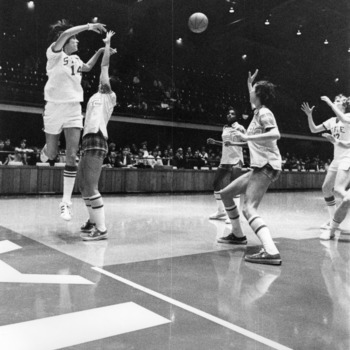 N.C. State's #14 Susan Yow with a jump pass during women's basketball game