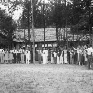 Wake County - July 14-17, 1941, Camp Whispering Pines. Club Members and agents salute the flag during the Wild Life Conference