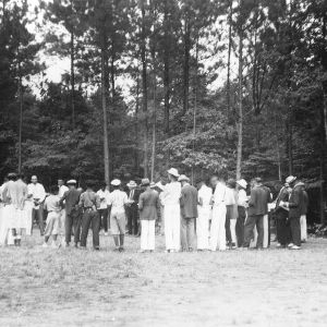 Wake County - July 14-17, 1941. Second State 4-H Wild Life Conference. Camp Whispering Pines scene twice a day as club members salute the flag