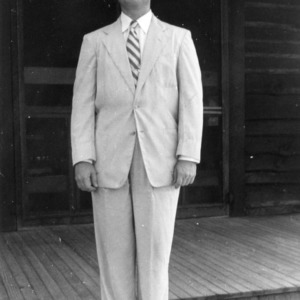 Unidentified man, a member of 4-H Young Men and Women