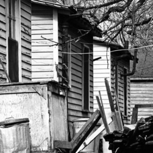 Backs of several rundown homes in Raleigh, NC