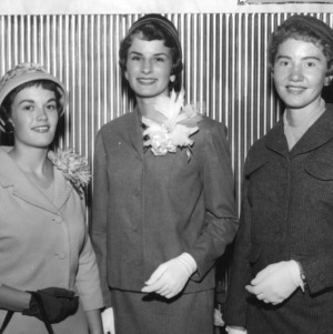 From left to right, Patsy Harris of Stanly County, 2nd place winner; Mary Ross Henley of Chatham County, 1st place winner; and Marvarene Byrd of Wilkes County, 3rd place winner participating in the 4-H Club Dress Revue contest