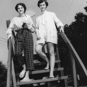 Betty Jean Parlres and Patricia Wiggs of Wayne County, North Carolina modeling their entries in the 4-H Dress Revue