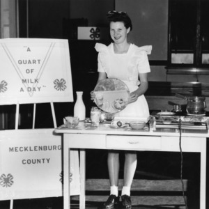 Marion Boulware of Mecklenburg County, North Carolina, displaying her meal at a dairy foods demonstration