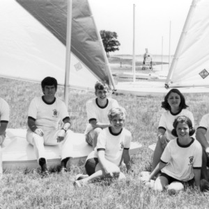 Campers sitting on sailboats at Mitchell 4-H Camp