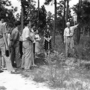 4-H members examining a tree at the Wildlife Conservation Camp in Indian Springs, North Carolina