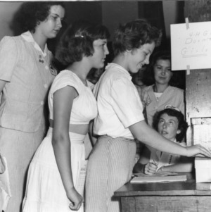 Everybody was anxious to cast their votes in the election of North Carolina State 4-H Council officers. The campaigning was so effective until the first election wound up in a tie