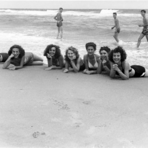 Group of women posing on the beach at Manteo, North Carolina, 4-H Camp